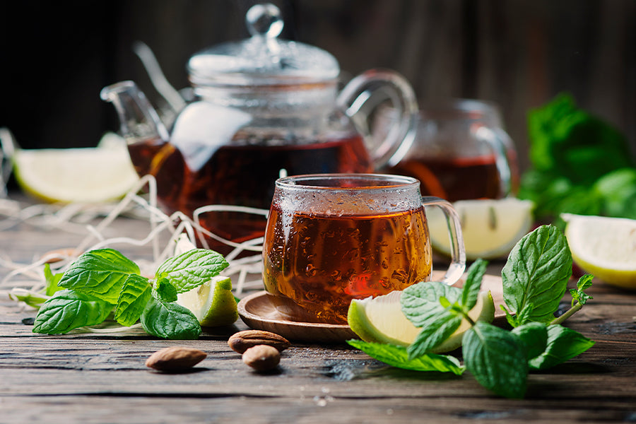 Hot Moroccan tea on a wooden table