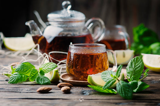 Hot Moroccan tea on a wooden table