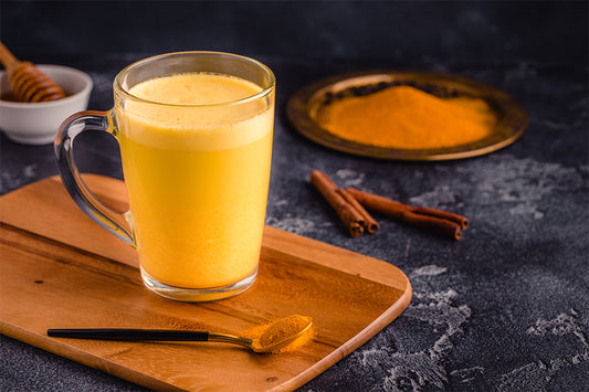 Turmeric tea in a transparent glass